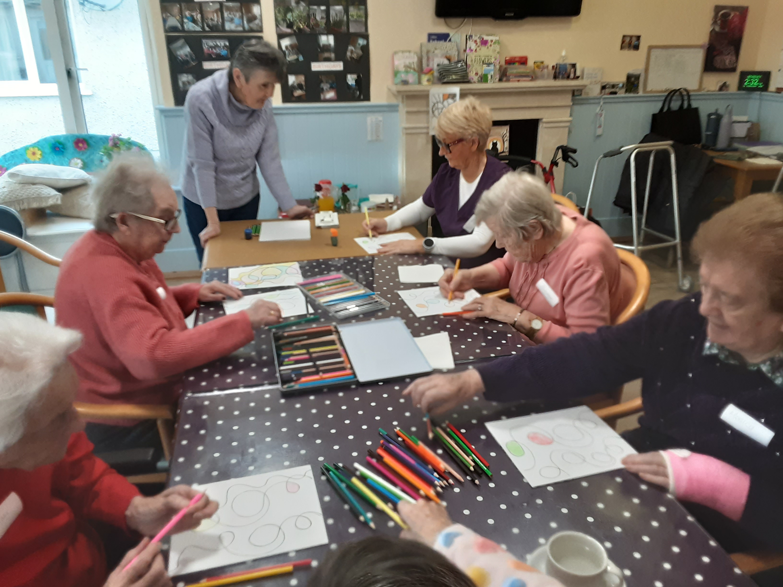 residents of the nursing home enjoying a music session